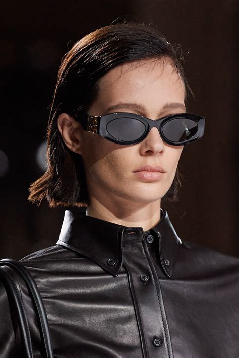 miu miu black and gold sunglasses|miu sunglasses 2022.